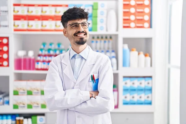 Young Hispanic Man Pharmacist Smiling Confident Standing Arms Crossed Gesture — Foto Stock