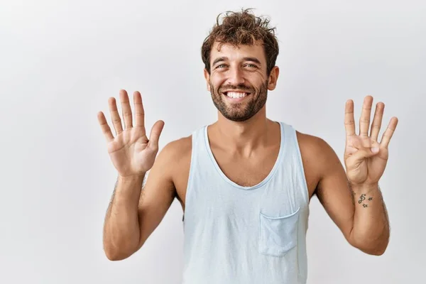 Joven Hombre Guapo Pie Sobre Fondo Aislado Mostrando Señalando Hacia —  Fotos de Stock