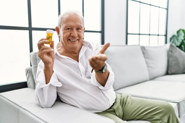 Senior Man Holding Pills Smiling Cheerful Offering Palm Hand Giving — Stock fotografie
