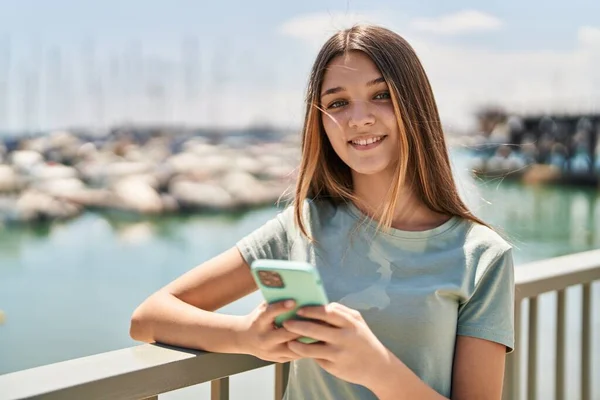 Adorable Girl Smiling Confident Using Smartphone Seaside — 스톡 사진