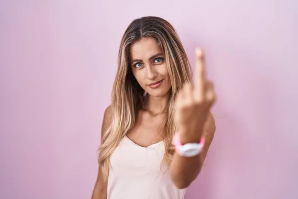 Young Blonde Woman Standing Pink Background Showing Middle Finger Impolite — Fotografia de Stock