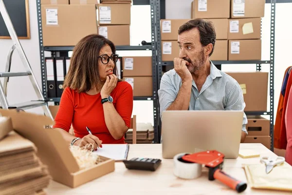 Middle Age Couple Working Small Business Ecommerce Looking Stressed Nervous —  Fotos de Stock
