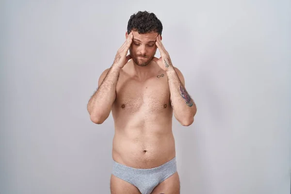 Young Hispanic Man Standing Shirtless Wearing Underware Hand Head Headache — Stock Photo, Image