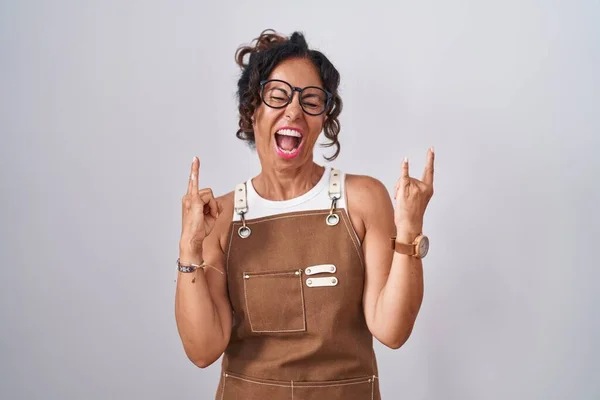 Middle Age Woman Wearing Apron White Background Shouting Crazy Expression — Stok fotoğraf