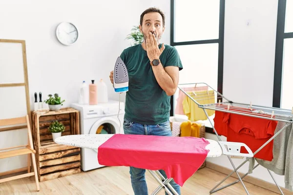 Middle Age Man Beard Ironing Clothes Home Covering Mouth Hand —  Fotos de Stock