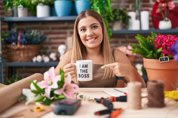 Young Blonde Woman Working Florist Shop Holding Boss Cup Smiling — Fotografia de Stock