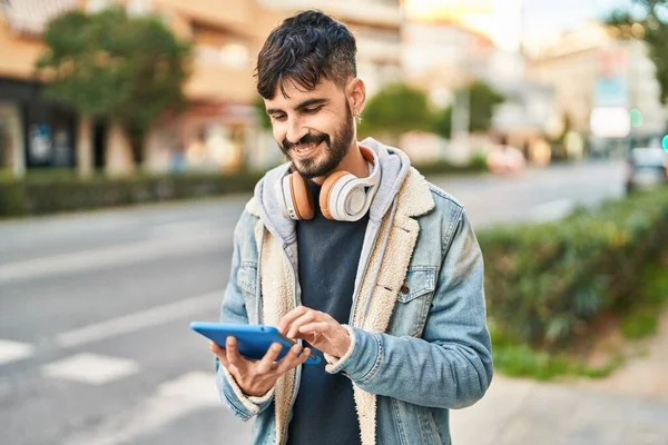 Young Hispanic Man Smiling Confident Using Touchpad Street — Stockfoto