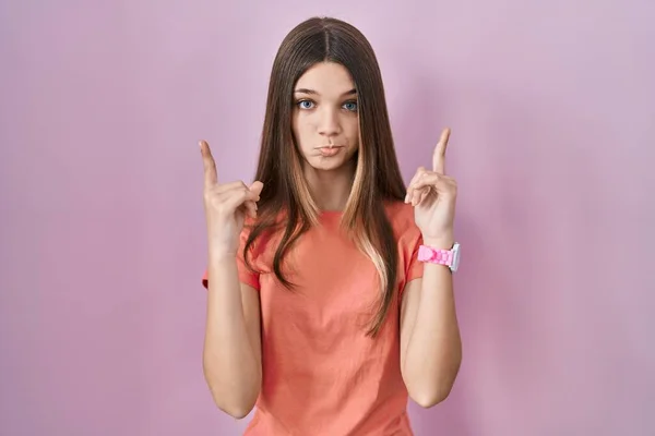 Teenager Girl Standing Pink Background Pointing Looking Sad Upset Indicating — 스톡 사진