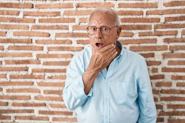 Senior Man Grey Hair Standing Bricks Wall Looking Fascinated Disbelief — Photo