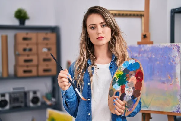 Young Woman Artist Standing Serious Expression Art Studio — Foto Stock