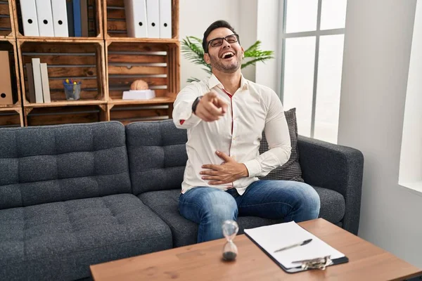 Young Hispanic Man Beard Working Consultation Office Laughing You Pointing — Stock Photo, Image