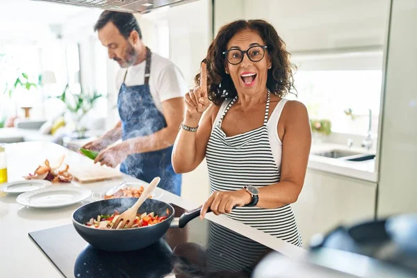 Middle Age Couple Cooking Mediterranean Food Home Surprised Idea Question — Stock Fotó