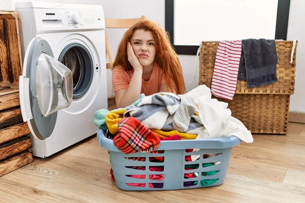 Young Redhead Woman Boring Washing Clohes Laundry Room — Stok fotoğraf