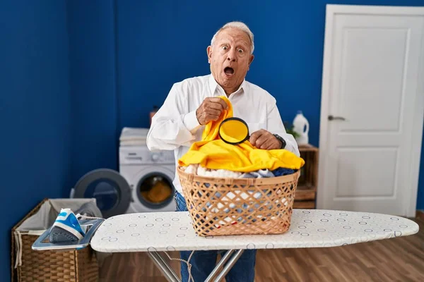 Senior Man Grey Hair Holding Magnifying Glass Looking Stain Clothes — Fotografia de Stock