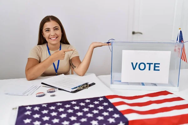 Young Brunette Woman Political Election Sitting Ballot Amazed Smiling Camera — Stock Photo, Image