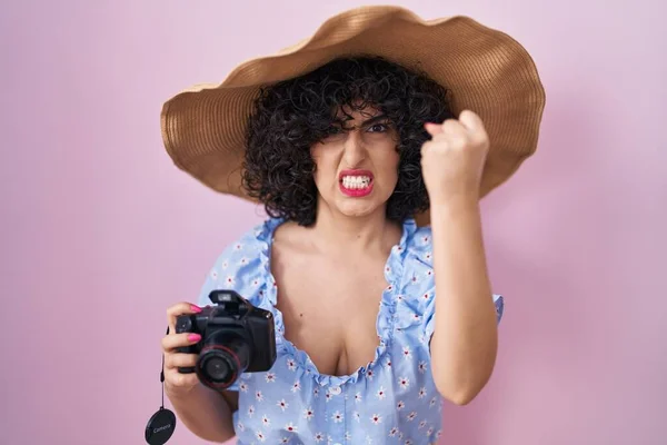 Young Brunette Woman Curly Hair Using Reflex Camera Annoyed Frustrated — Stockfoto