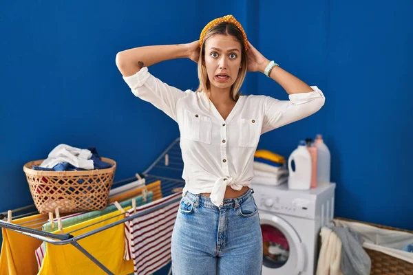 Young Blonde Woman Laundry Room Crazy Scared Hands Head Afraid — Stockfoto