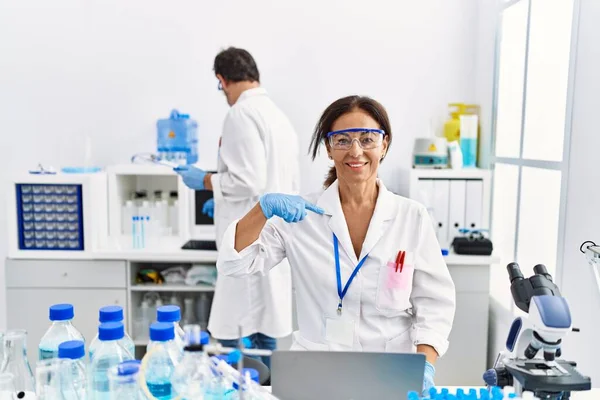 Middle Age Woman Working Scientist Laboratory Pointing Finger One Self — Stockfoto