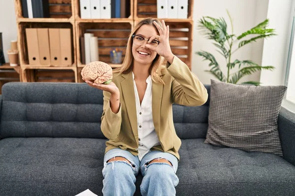 Young Blonde Woman Working Therapy Office Holding Brain Smiling Happy — Photo