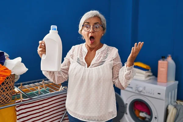 Middle Age Woman Grey Hair Doing Laundry Detergent Bottle Scared — Stok fotoğraf