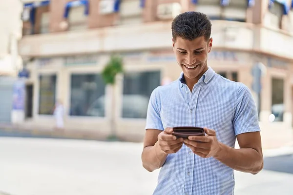 Young Hispanic Man Smiling Confident Holding Leather Wallet Street — Stock fotografie