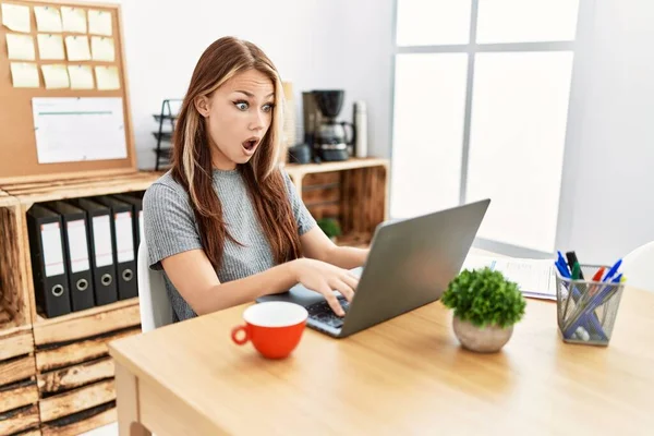 Young Brunette Woman Working Office Laptop Afraid Shocked Surprise Expression — Foto de Stock