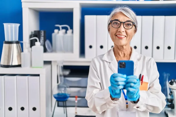 Middle Age Grey Haired Woman Scientist Using Smartphone Working Laboratory — Stock fotografie