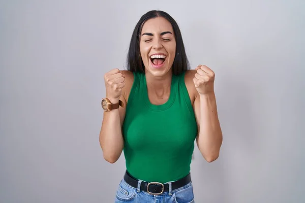 Young Woman Standing Isolated Background Excited Success Arms Raised Eyes — Stockfoto