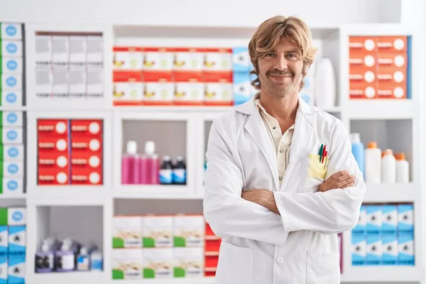 Young Man Pharmacist Smiling Confident Standing Arms Crossed Gesture Pharmacy — Stock Photo, Image