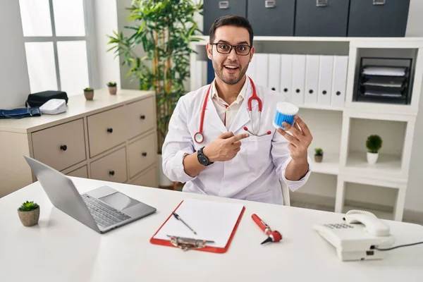 Young Hispanic Doctor Man Beard Holding Ear Cotton Buds Smiling — Stock Photo, Image