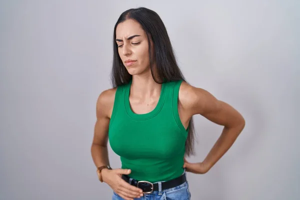 Young Woman Standing Isolated Background Suffering Backache Touching Back Hand — Foto Stock