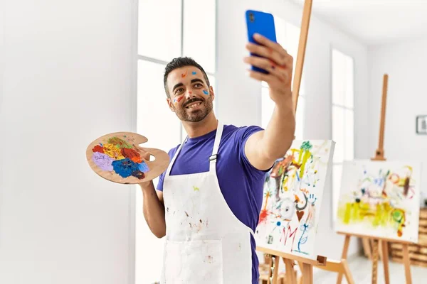 Young Hispanic Man Smiling Confident Make Selfie Smartphone Drawing Art — Foto de Stock