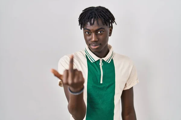 African Man Dreadlocks Standing Isolated Background Showing Middle Finger Impolite — Stock Photo, Image