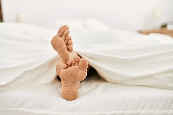 Middle age hispanic woman sleeping at bedroom