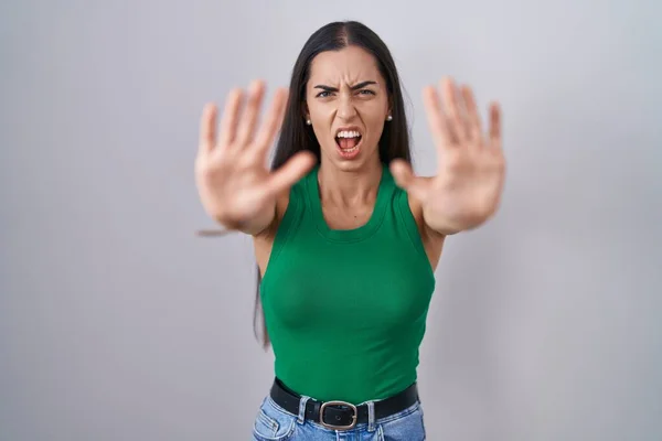 Young Woman Standing Isolated Background Doing Stop Gesture Hands Palms — Stok Foto