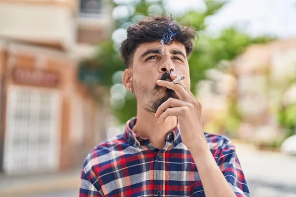 Young Hispanic Man Smoking Street — Zdjęcie stockowe