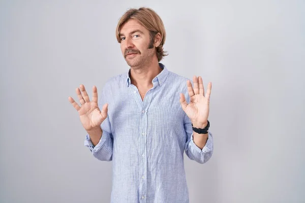 Caucasian Man Mustache Standing White Background Moving Away Hands Palms — Stock Photo, Image