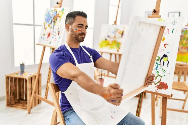 Young Hispanic Man Holding Draw Canvas Art Studio — Foto de Stock