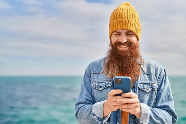 Young Redhead Man Smiling Confident Using Smartphone Seaside — Photo