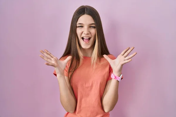 Teenager Girl Standing Pink Background Celebrating Mad Crazy Success Arms — Stock Photo, Image