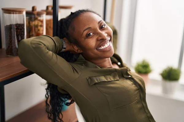 African American Woman Relaxed Hands Head Sitting Chair Home — Stockfoto