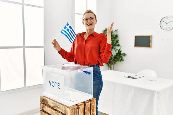 Young Brunette Woman Putting Envelop Ballot Box Holding Greece Flag — Stock Photo, Image