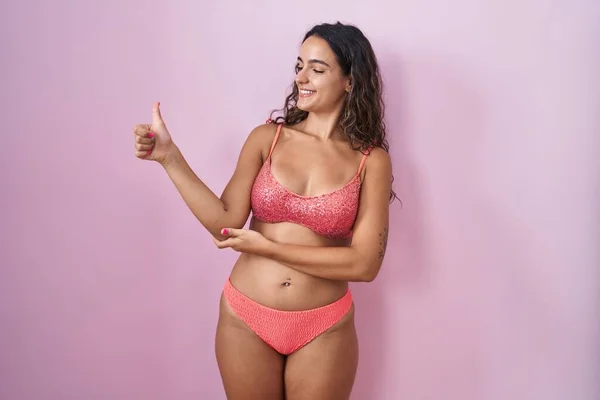 Young Hispanic Woman Wearing Lingerie Pink Background Looking Proud Smiling — Stock Photo, Image