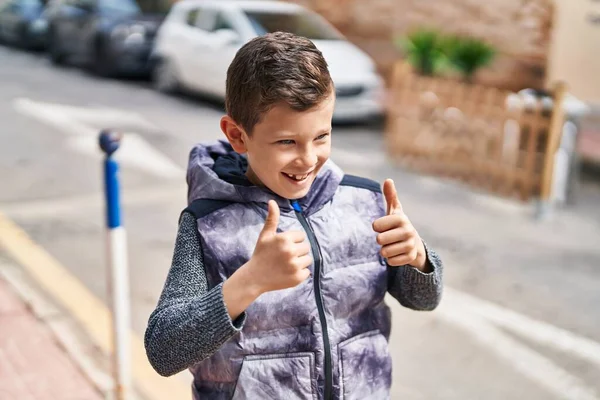 Blond Child Smiling Confident Doing Sign Thumb Street — Stock Photo, Image