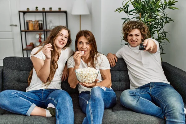 Mother Couple Watching Movie Sitting Sofa Home — Stockfoto