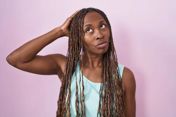African American Woman Standing Pink Background Confuse Wondering Question Uncertain — Stock Photo, Image