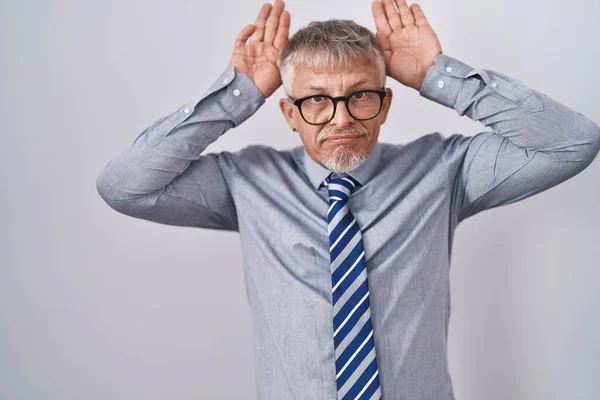 Hispanic Business Man Grey Hair Wearing Glasses Doing Bunny Ears — Stock Photo, Image