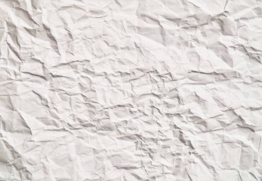 Kırışıklıkları olan beyaz buruşuk kağıt dokusu. Hasarlı ve yırtık çarşaf