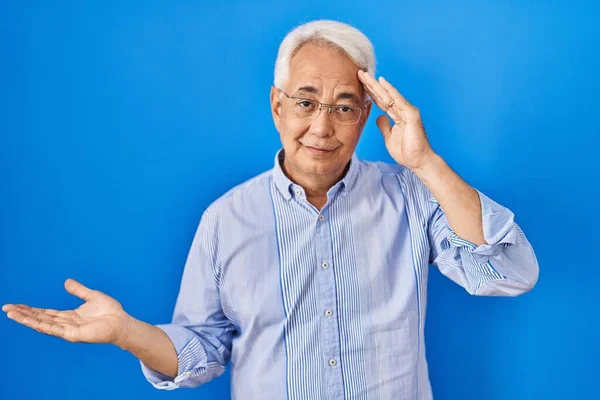 Hispanic Senior Man Wearing Glasses Confused Annoyed Open Palm Showing — Stock Photo, Image