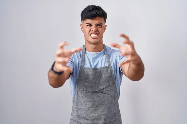 Hispanic Young Man Wearing Apron White Background Shouting Frustrated Rage — Stock Photo, Image